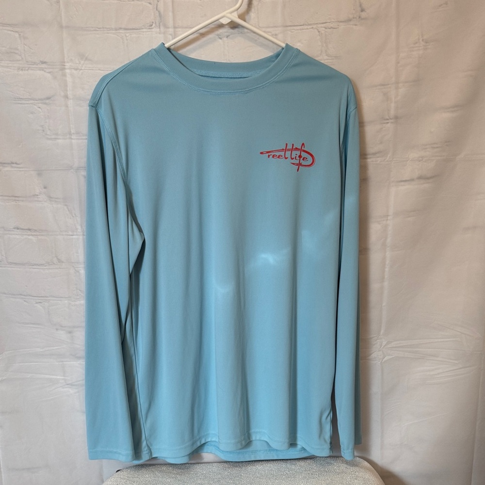 Reel Life Men's Long Sleeve UV Performance Sky blue an American flag graphic (M)